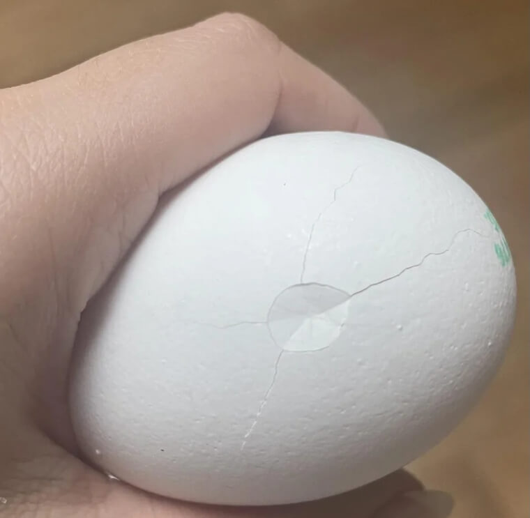 Salvage a Cracked Egg by Wrapping It in Waxed Paper